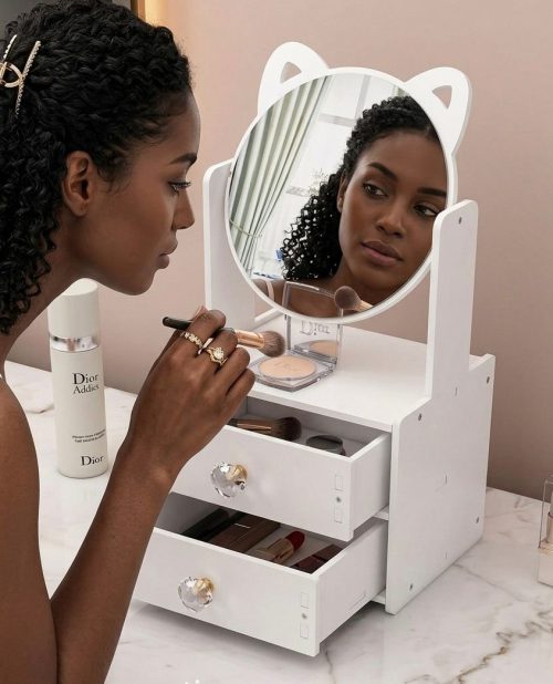 White makeup organiser with two drawers and a cat-ear round mirror, in use — Electromart Uganda