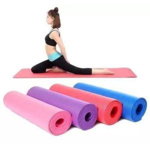 Extra-thick 8mm yoga exercise mats in pink, purple, red and blue, rolled — Electromart Uganda
